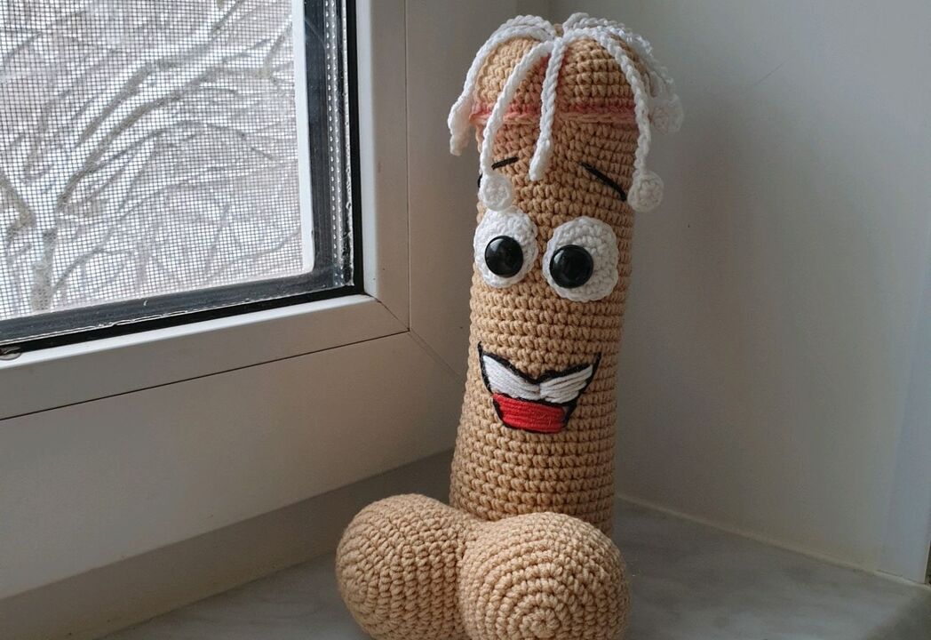 a knitted toy symbolizes an enlarged penis